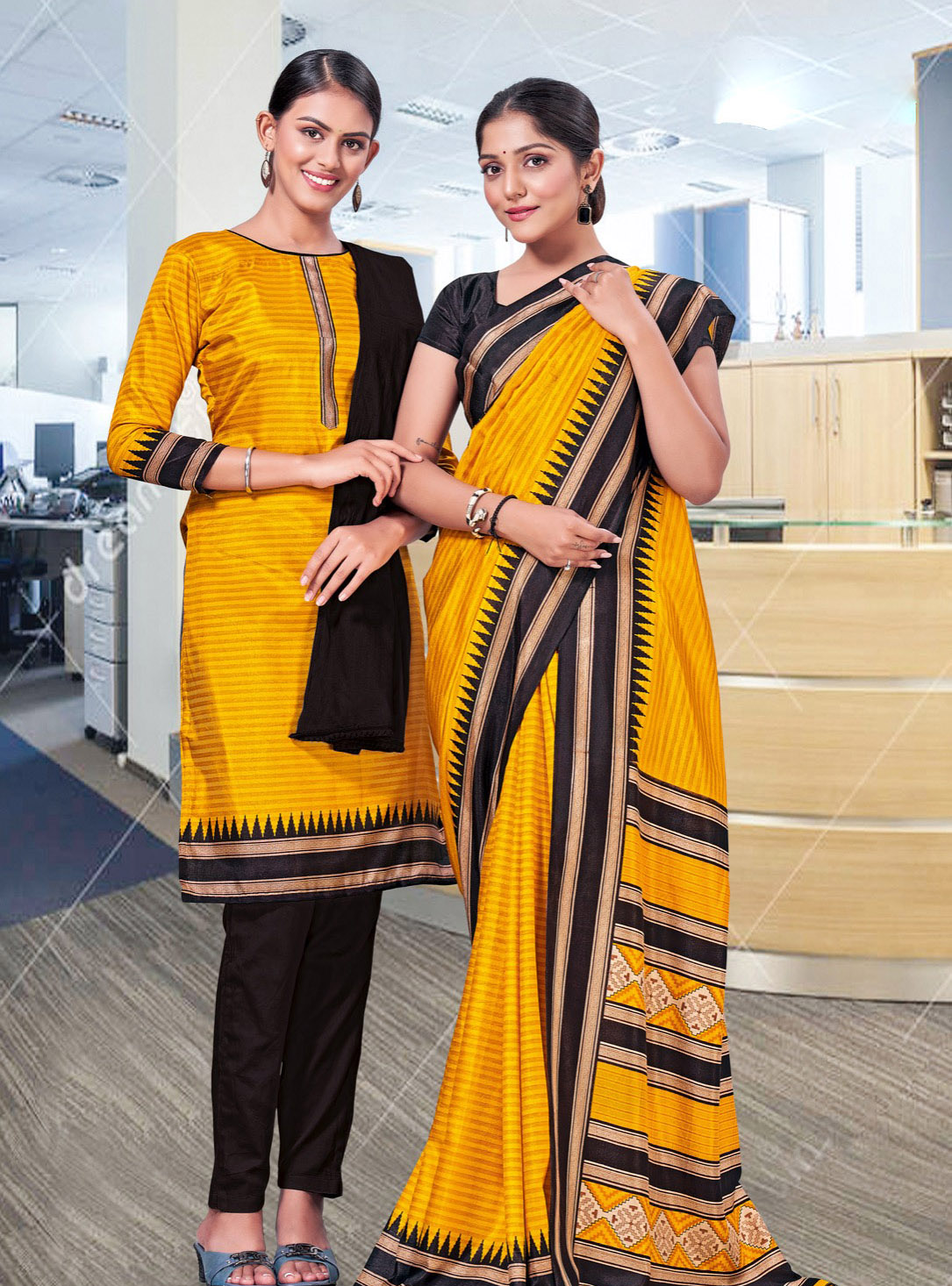 Two women wearing uniform saris in yellow and black.