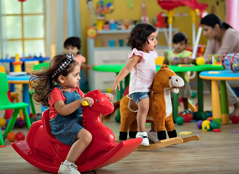 Playschool kids are happily playing with K square edutainment  indoor playing items